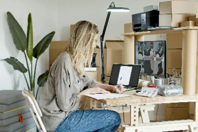 Candid second shot of someone at a home desk
